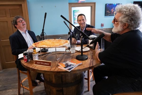 Jim Gabour (right) entertains Peter Ricchiuti and fellow author Adam Bryant with colorful tales of cats, family, music and pot sales over lunch at NOLA Pizza