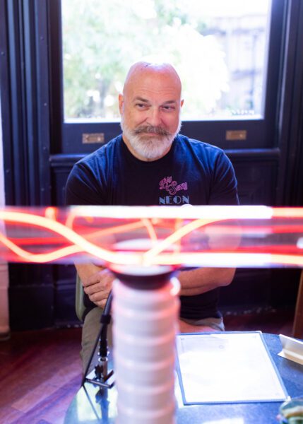 Nate Sheaffer, owner of Big Sexy Neon, one of only a few hundred glass-blowing neon artists left in the US, works out of a studio on Oretha Castle Hailey Boulevard in Central City New Orleans