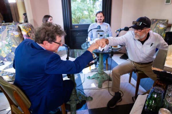 Peter Ricchiuti gets in on the first-bump action with Paul Kelly as Shaun Watson referees