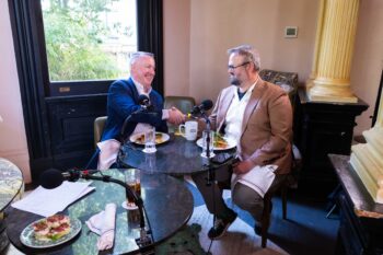 John Roberts and John Stubbs at Out to Lunch. Is John Roberts agreeing to invest in Jewel of the South or is John Stubbs agreeing to buy John Roberts a Brandy Cruster?